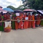 Anganwadi Workers And Helpers Staged Road Blockade.   